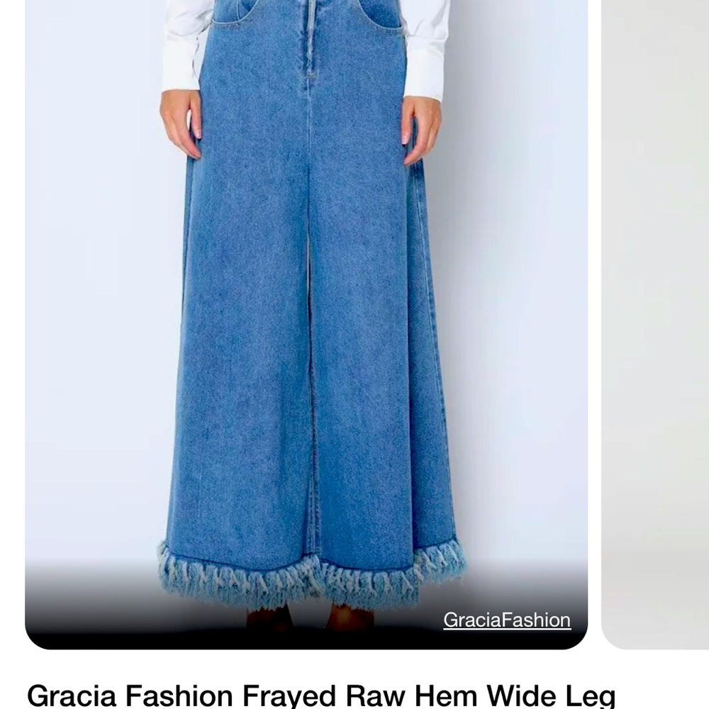 Garcia brand, NWT, high rise, wide leg women’s jeans with fringe hem.